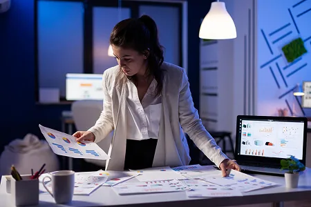 busy-business-woman-working-on-financial-reports-c-2025-02-17-06-30-19-utc-1